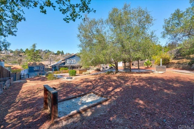 view of yard with fence