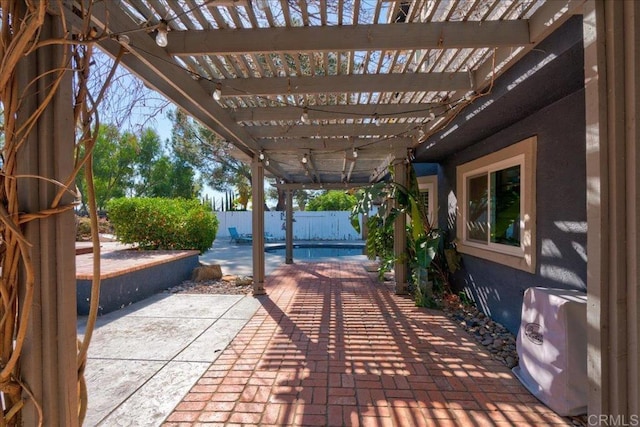 view of patio / terrace with fence and a pergola