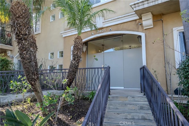 3401 S Bentley Ave Unit 306, Los Angeles, CA 90034 - property entrance with stucco siding