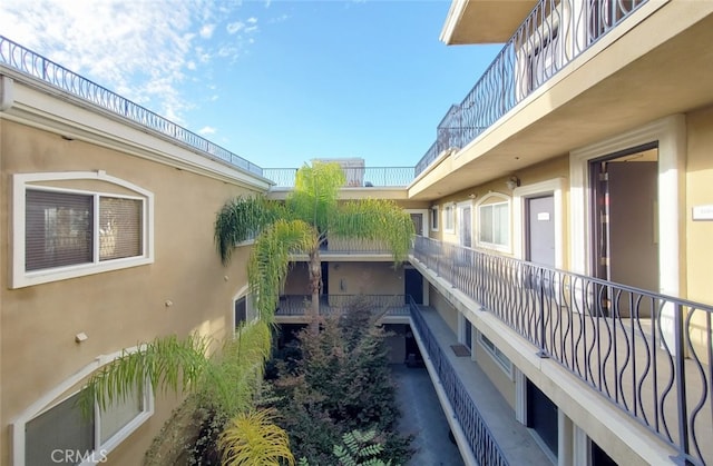 exterior space featuring stucco siding