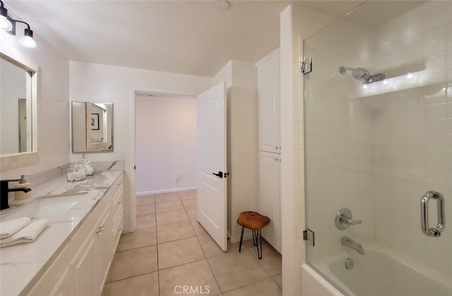 full bath featuring tile patterned flooring, vanity, and shower / washtub combination