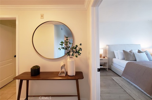 bedroom with ornamental molding