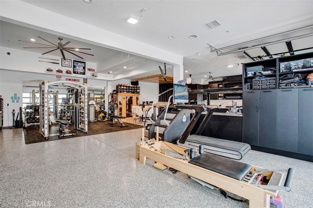 workout area featuring visible vents, arched walkways, a ceiling fan, and recessed lighting