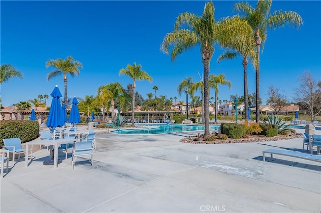 pool with a patio