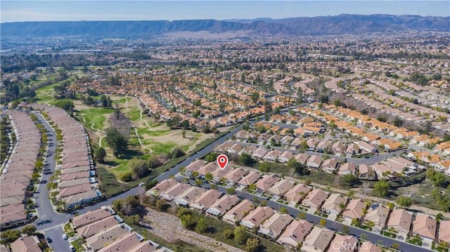 bird's eye view with a residential view and a mountain view