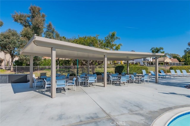 exterior space with a patio and fence