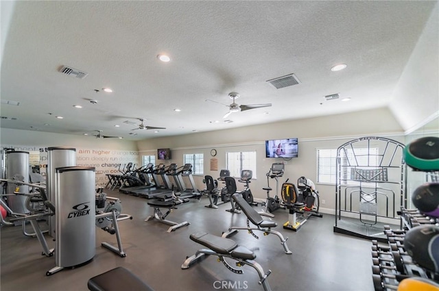 gym featuring visible vents, recessed lighting, and a textured ceiling