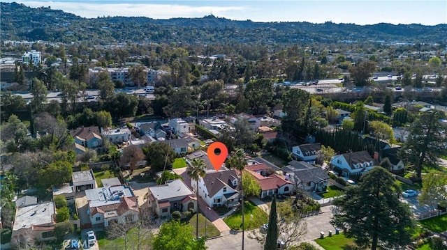 drone / aerial view with a mountain view and a residential view