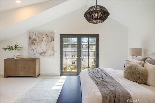 carpeted bedroom featuring access to exterior, french doors, baseboards, and lofted ceiling