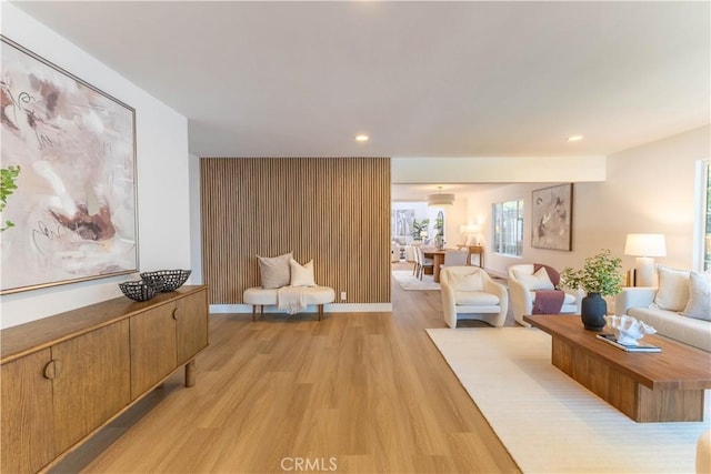 living room with recessed lighting and light wood finished floors