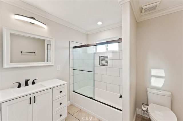 full bath with visible vents, toilet, ornamental molding, combined bath / shower with glass door, and vanity