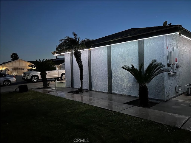 exterior space with stucco siding