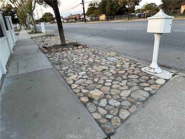 view of road featuring sidewalks