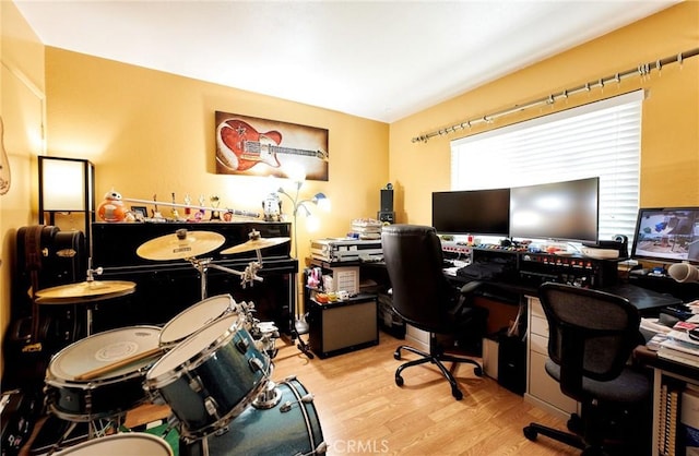home office with wood finished floors