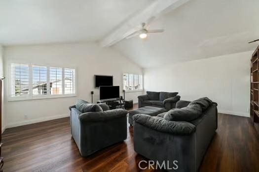 living area with vaulted ceiling with beams, dark wood-style floors, and baseboards