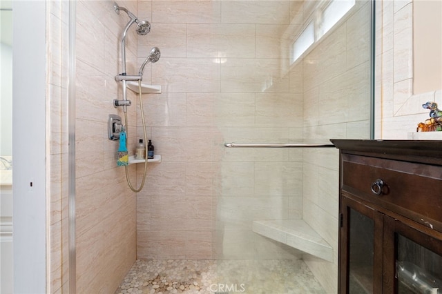 bathroom featuring a shower stall