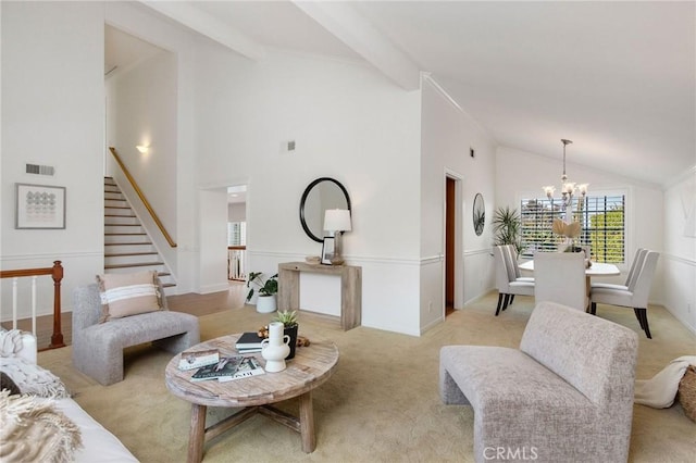 living room with light carpet, visible vents, a notable chandelier, stairs, and beam ceiling