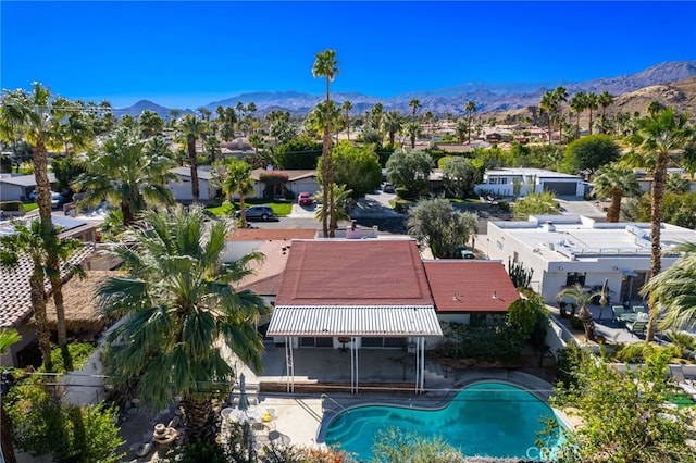 birds eye view of property with a residential view and a mountain view