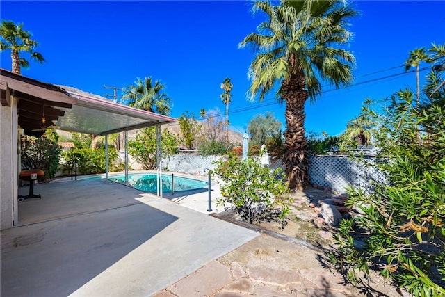 view of pool with a fenced in pool, a grill, a fenced backyard, and a patio