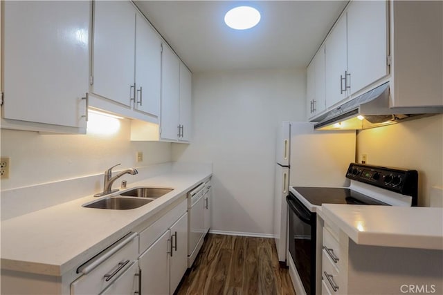 kitchen with under cabinet range hood, a sink, white cabinets, light countertops, and electric range oven