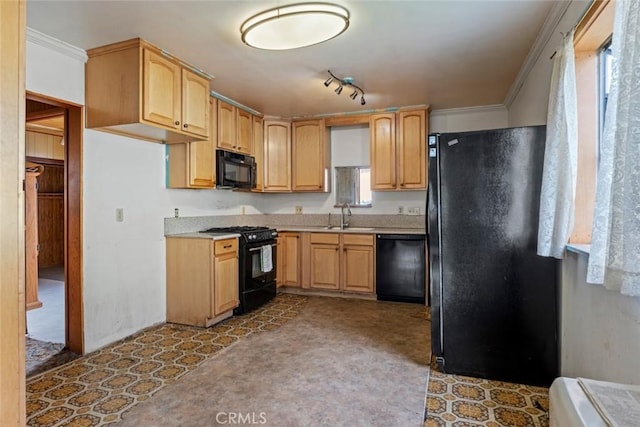 kitchen with ornamental molding, tile patterned floors, light countertops, black appliances, and a sink