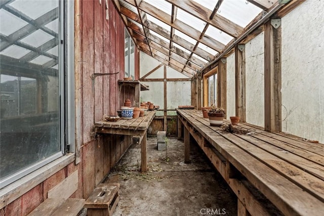 sunroom with lofted ceiling