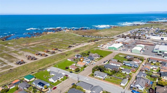 aerial view with a water view and a residential view