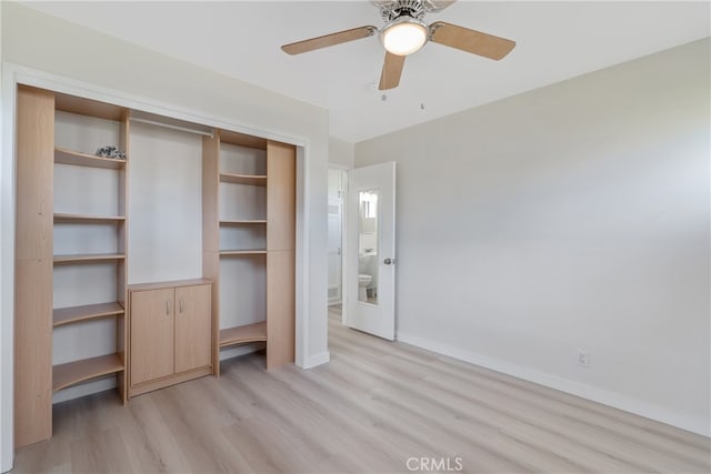 unfurnished bedroom with a ceiling fan, light wood-style floors, a closet, and baseboards