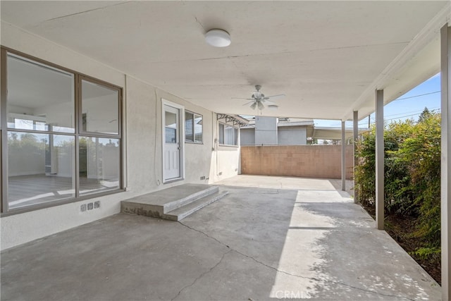 view of patio featuring a ceiling fan