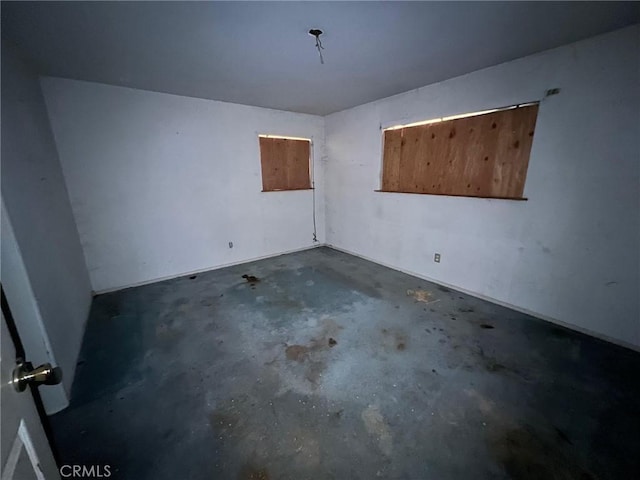 empty room featuring concrete floors