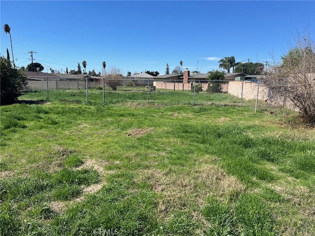 view of yard featuring fence