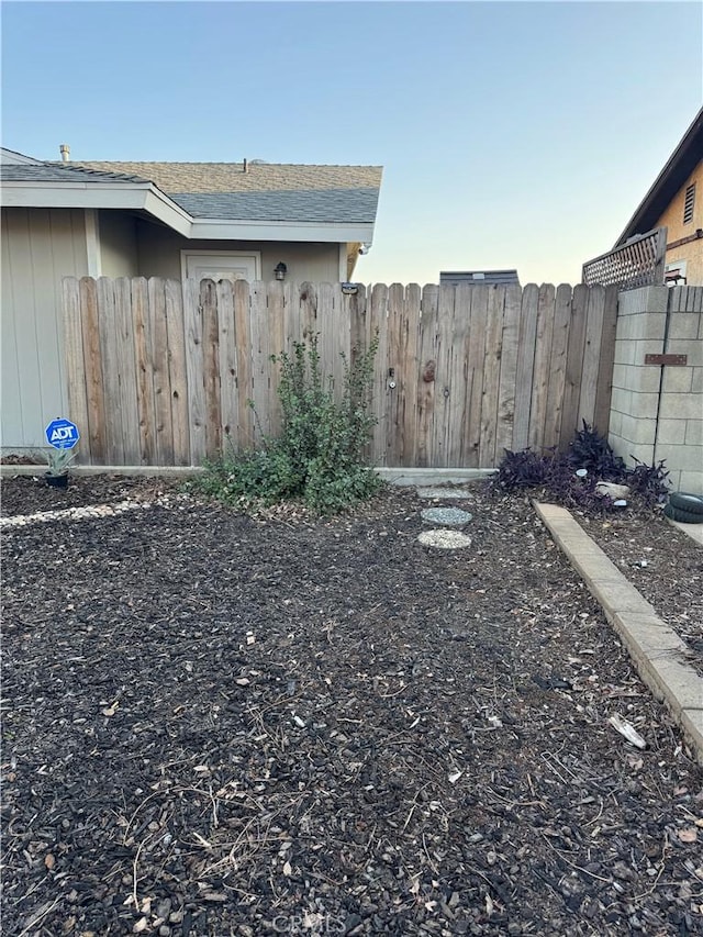 view of yard featuring fence