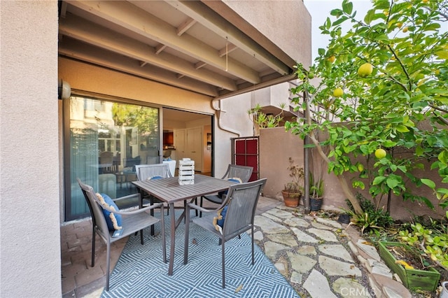 view of patio with outdoor dining area