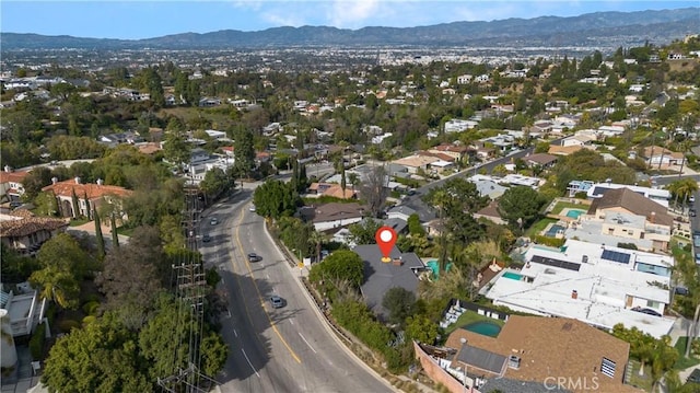 birds eye view of property featuring a residential view and a mountain view