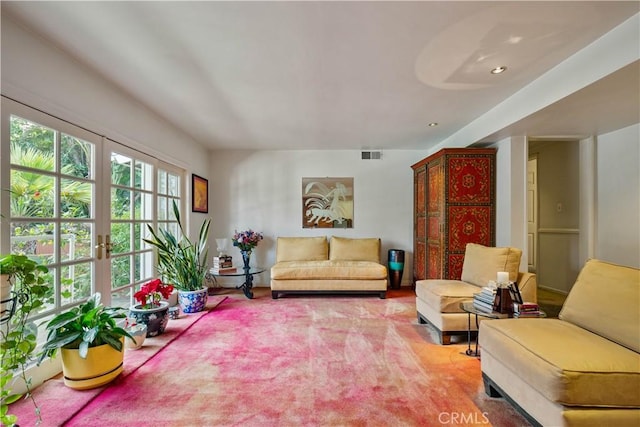 interior space with french doors and visible vents