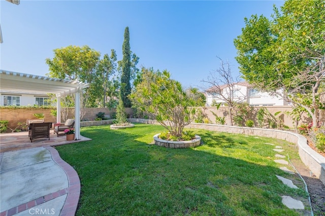 view of yard featuring a patio, a fenced backyard, and a pergola