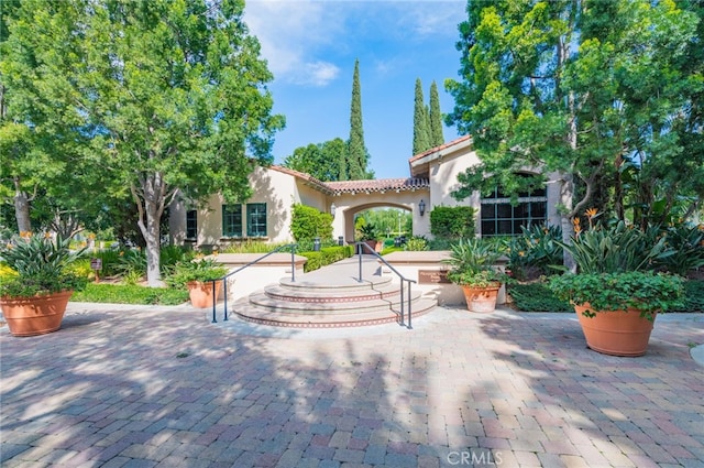 view of home's community with a patio