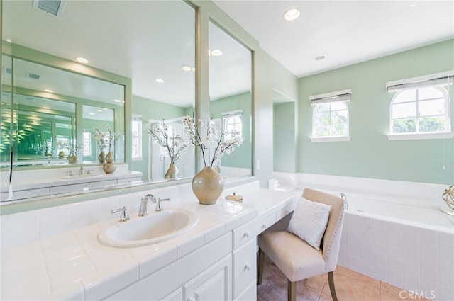 bathroom with visible vents, a garden tub, tile patterned flooring, vanity, and recessed lighting