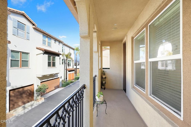 balcony featuring a residential view