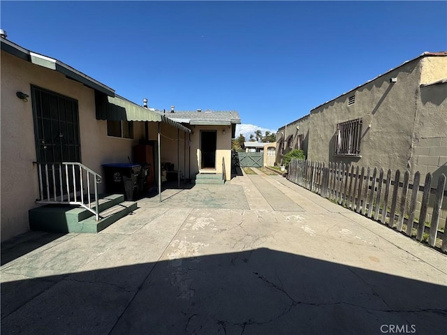 view of patio with fence