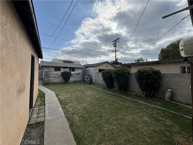 view of yard featuring fence