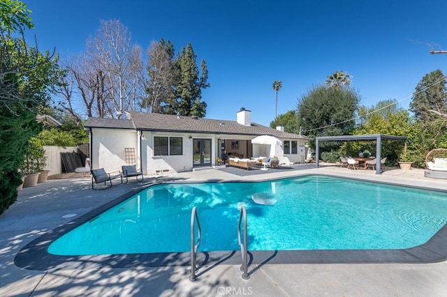 6164 Fenwood Ave, Woodland Hills, CA 91367 - view of pool with french doors, a patio, and outdoor lounge area