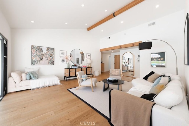 6164 Fenwood Ave, Woodland Hills, CA 91367 - living area with recessed lighting, light wood-style floors, beam ceiling, arched walkways, and high vaulted ceiling