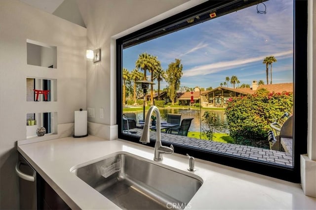 details with light countertops and a sink