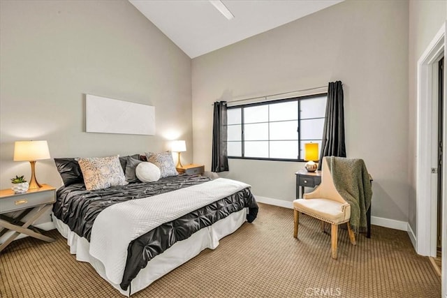 carpeted bedroom with lofted ceiling, ceiling fan, and baseboards