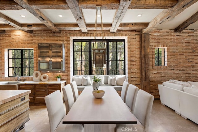 31 Blue Heron, Irvine, CA 92603 - dining room with recessed lighting, beam ceiling, coffered ceiling, and brick wall