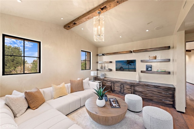 living area with recessed lighting, vaulted ceiling with beams, an inviting chandelier, and wood finished floors