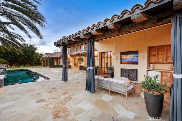 view of patio featuring an outdoor pool