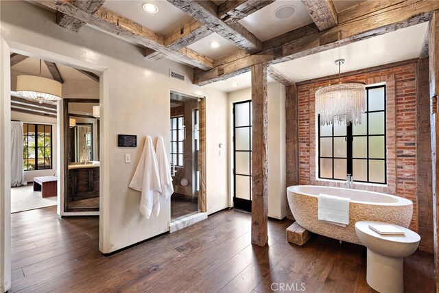 31 Blue Heron, Irvine, CA 92603 - interior space with visible vents, beamed ceiling, dark wood finished floors, brick wall, and coffered ceiling