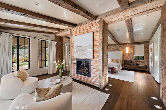 31 Blue Heron, Irvine, CA 92603 - living area featuring beam ceiling, a fireplace, wood-type flooring, brick wall, and visible vents